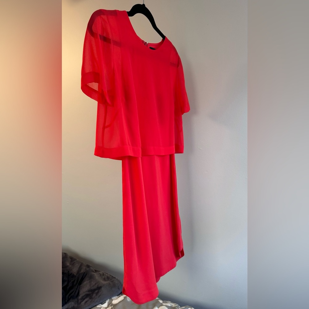 Never worn BCBG dress w/ sheer cape detail. size small. Cherry red or “poppy”.